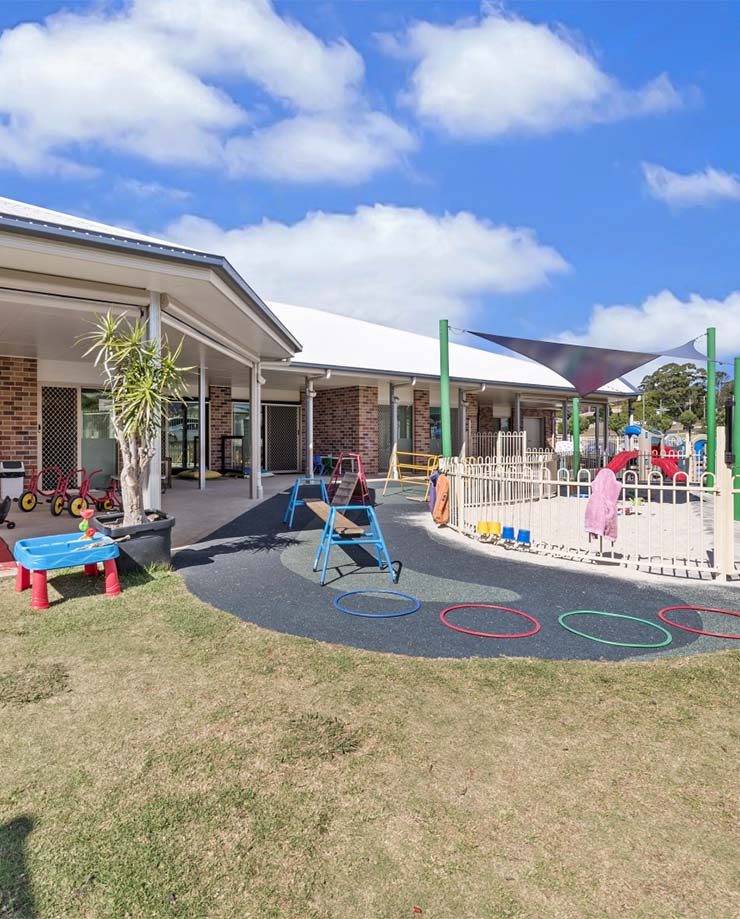 Kate's Place exterior play equipment and sand pit